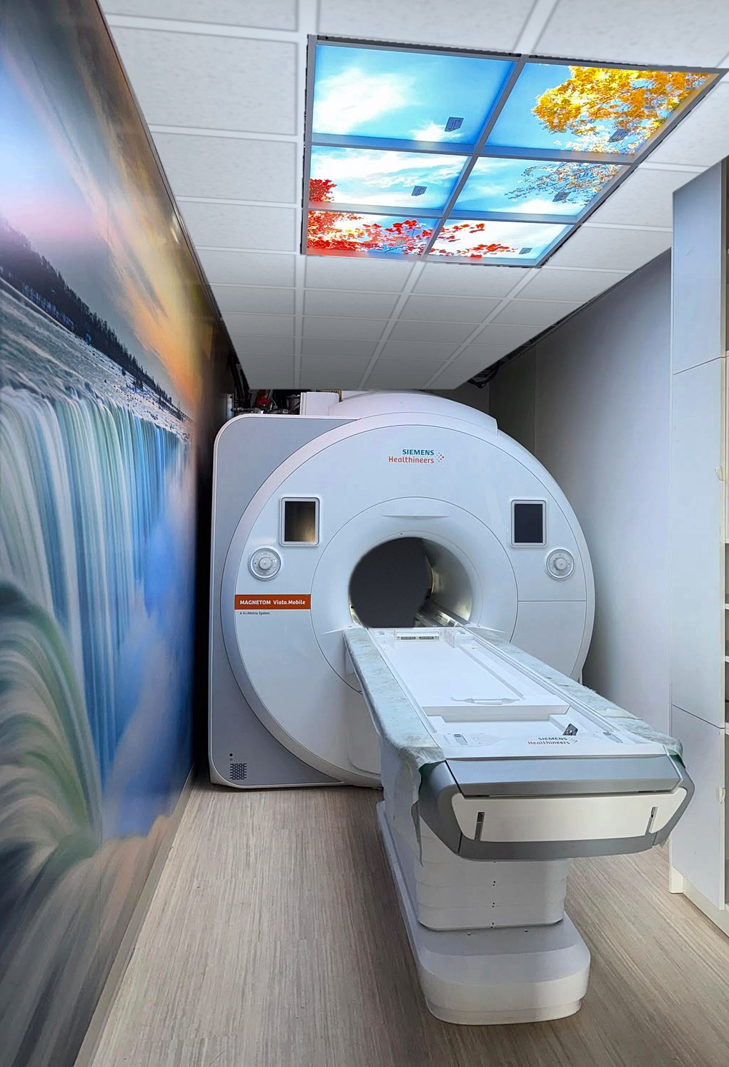 Interior of the Apex WalkIn MRI scan room with a Siemens MAGNETOM Vida.Mobile scanner and patient table